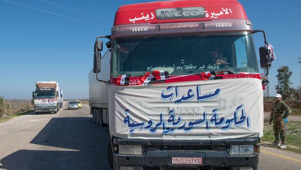 Конвой, доставивший гуманитарную помощь в поселок Ибта в Сирии. Архивное фото - 俄羅斯衛星通訊社