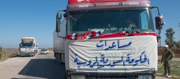 Конвой, доставивший гуманитарную помощь в поселок Ибта в Сирии. Архивное фото - 俄罗斯卫星通讯社