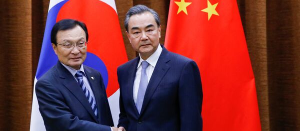 Chinese Foreign Minister Wang Yi meets South Korean special envoy Lee Hae-chan at the foreign ministry in Beijing - 俄罗斯卫星通讯社