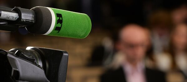 Микрофон с логотипом RT - 俄罗斯卫星通讯社