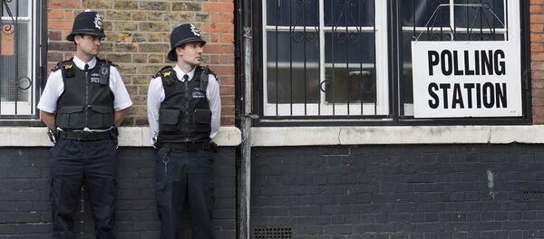 英國內政大臣保留住議會席位 - 俄羅斯衛星通訊社