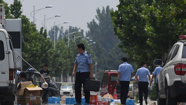Полиция осматривает территорию, прилегающую к месту взрыва у детсада - 俄罗斯卫星通讯社