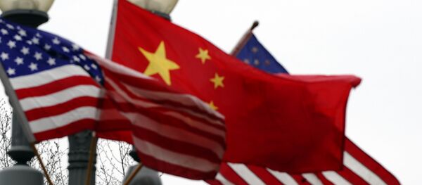 Chinese and US national flags - 俄罗斯卫星通讯社