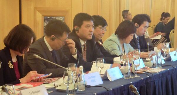 中国中央电视台体育频道副总监李岳（左三） - 俄罗斯卫星通讯社