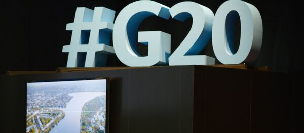 В международном пресс-центре, расположенном в выставочном центре Hamburg Messe в Гамбурге, накануне саммита G20 В международном пресс-центре, расположенном в выставочном центре Hamburg Messe в Гамбурге, накануне саммита G20 - 俄罗斯卫星通讯社