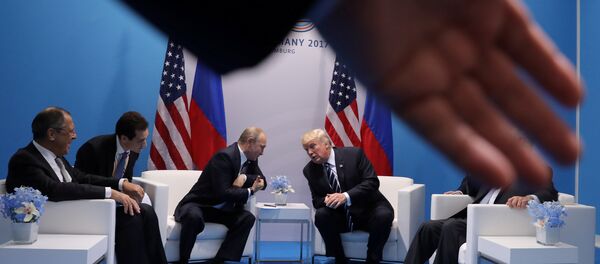 Russia's President Vladimir Putin talks to U.S. President Donald Trump during their bilateral meeting at the G20 summit in Hamburg Russia's President Vladimir Putin talks to U.S. President Donald Trump during their bilateral meeting at the G20 summit in Hamburg - 俄罗斯卫星通讯社