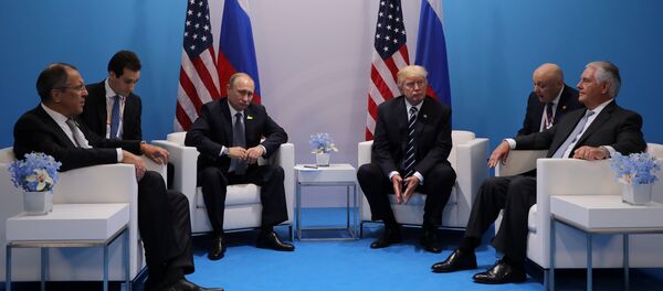 Russia's President Vladimir Putin talks to U.S. President Donald Trump during their bilateral meeting at the G20 summit in Hamburg Russia's President Vladimir Putin talks to U.S. President Donald Trump during their bilateral meeting at the G20 summit in Hamburg - 俄罗斯卫星通讯社