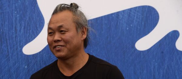 Director Kim Ki-duk poses during a photocall - 俄罗斯卫星通讯社