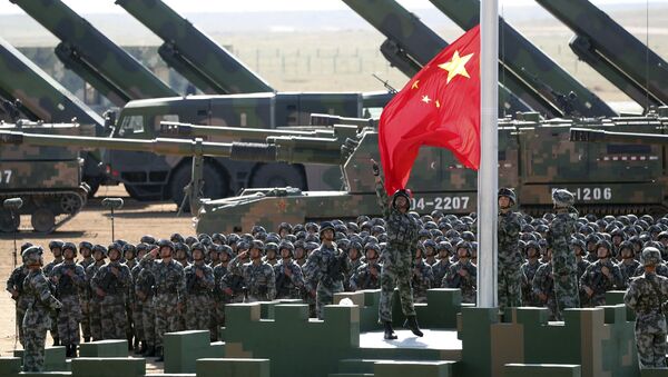 Chinese People's Liberation Army (PLA) troops perform a flag raising ceremony - 俄罗斯卫星通讯社