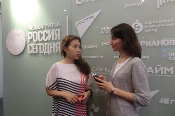 华联会主席黄静接受俄罗斯卫星通讯社记者采访 - 俄罗斯卫星通讯社