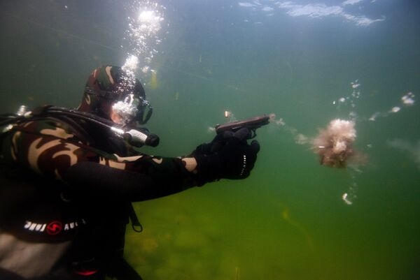 9毫米長的GSH-18手槍的主要特點之一是其彈匣容彈量為18發，這對蘇俄手槍來說是創紀錄的 - 俄羅斯衛星通訊社