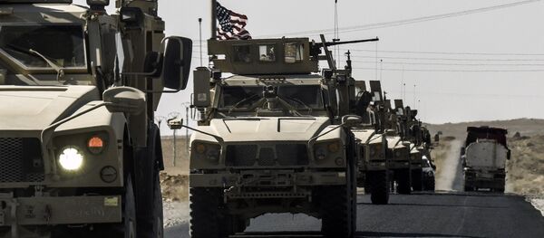 A US military convoy drives on a highway from Kobane to Ain Issa A US military convoy drives on a highway from Kobane to Ain Issa - 俄罗斯卫星通讯社