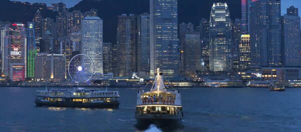 A general view of Victoria Peak and Central district over Victoria Harbor, in Hong Kong A general view of Victoria Peak and Central district over Victoria Harbor, in Hong Kong - 俄罗斯卫星通讯社