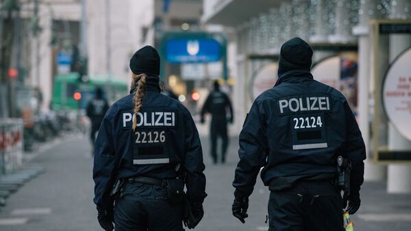 Сотрудники полиции недалеко от места теракта в Берлине - 俄罗斯卫星通讯社