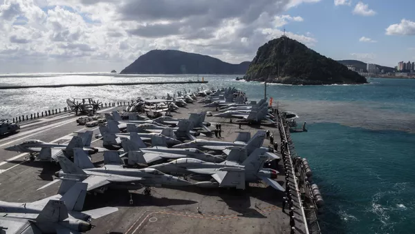The aircraft carrier USS Ronald Reagan maneuvers along the waters east of the Korean Peninsula - 俄羅斯衛星通訊社