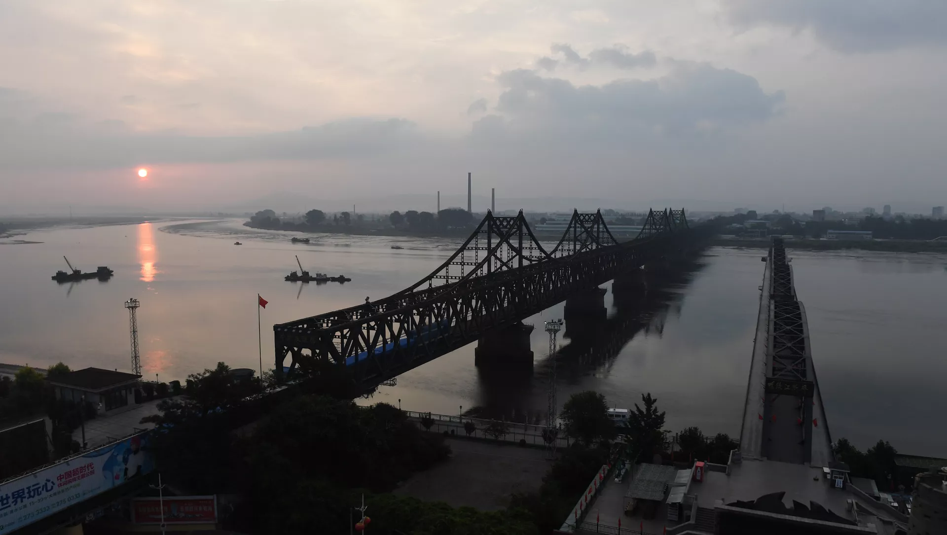 The Friendship Bridge (L) and Broken Bridge (R), which lead to North Korea, seen from Dandong