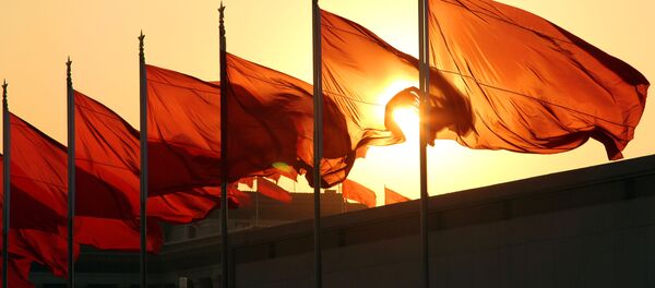 Китайские флаги на восходе - 俄罗斯卫星通讯社