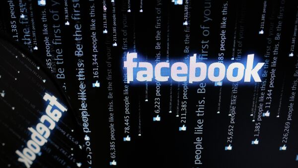Логотип социальной сети Фейсбук на экране компьютера - 俄羅斯衛星通訊社