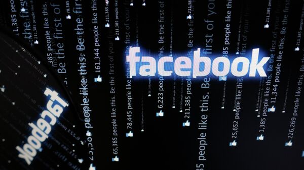 Логотип социальной сети Фейсбук на экране компьютера - 俄罗斯卫星通讯社