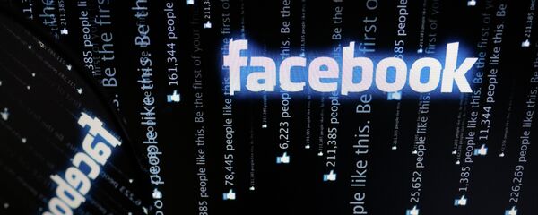 Логотип социальной сети Фейсбук на экране компьютера - 俄罗斯卫星通讯社