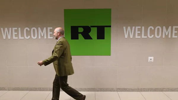Сотрудник в офисе телеканала Russia Today в Москве - 俄羅斯衛星通訊社