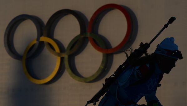 Спортсменка на тренировке женских национальных сборных по биатлону перед началом XXII зимних Олимпийских игр в Сочи - 俄羅斯衛星通訊社