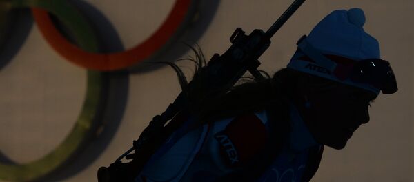 Спортсменка на тренировке женских национальных сборных по биатлону перед началом XXII зимних Олимпийских игр в Сочи - 俄羅斯衛星通訊社