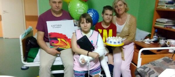 娜塔莉婭、阿納托利夫婦和收養的孩子們 娜塔莉婭、阿納托利夫婦和收養的孩子們 - 俄羅斯衛星通訊社