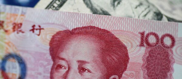 U.S. Dollar and China Yuan notes - 俄罗斯卫星通讯社