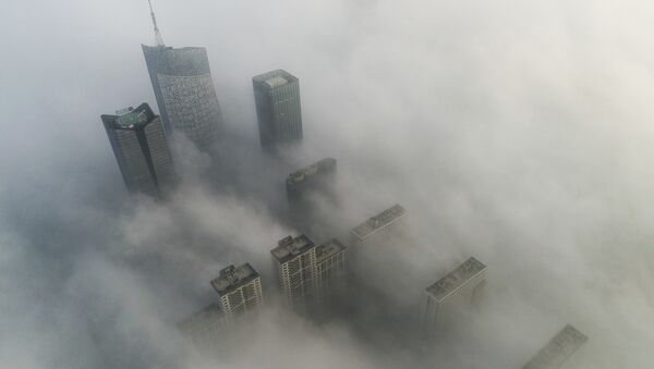 Skyscrapers are shrouded in fog in Hefei in eastern China's Anhui province - 俄罗斯卫星通讯社