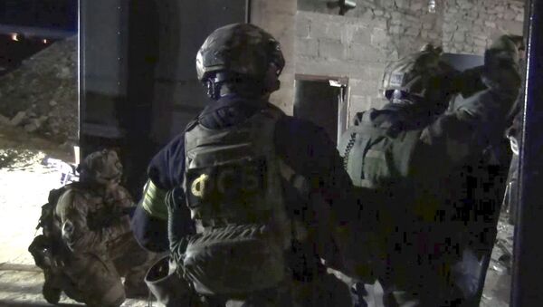 Сотрудники правоохранительных органов во время спецоперации в Дагестане. Архивное фото - 俄羅斯衛星通訊社