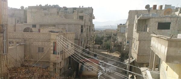 Гуманитарный коридор между Дамаском и Восточной Гутой в районе лагеря беженцев Вафидин в Сирии - 俄罗斯卫星通讯社