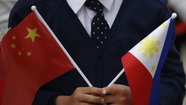 菲律賓與中國發展經濟關係，與美國的軍事援助相比，將獲更多優勢。 - 俄羅斯衛星通訊社