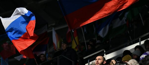 Флаги России на митинге За сильную Россию! в поддержку кандидата в президенты РФ Владимира Путина на стадионе Лужники - 俄罗斯卫星通讯社