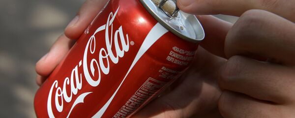 Банка Coca-Cola - 俄罗斯卫星通讯社