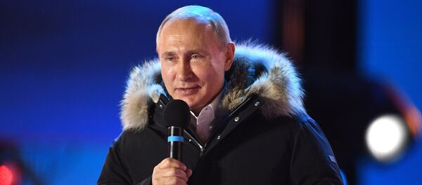 Президент РФ Владимир Путин на митинг-концерте на Манежной площади в Москве, посвященном годовщине воссоединения Крыма с Россией - 俄羅斯衛星通訊社