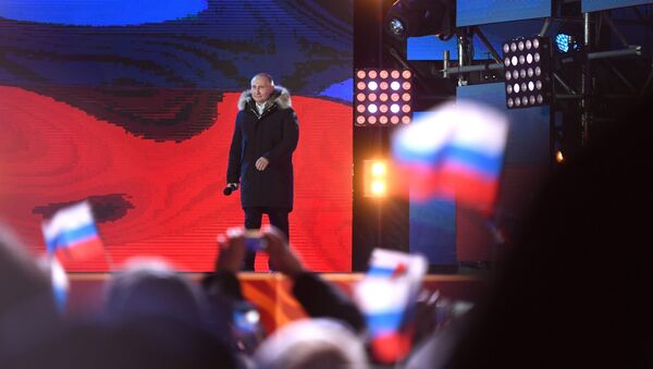 Президент РФ Владимир Путин на митинг-концерте на Манежной площади в Москве, посвященном годовщине воссоединения Крыма с Россией - 俄羅斯衛星通訊社