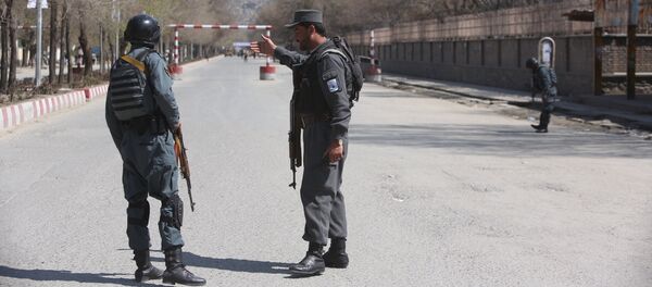 Police patrol the streets after a suicide attack in front of the Kabul university in Kabul - 俄罗斯卫星通讯社