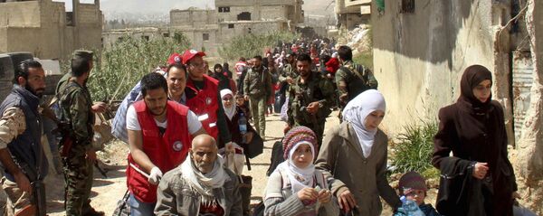 俄军向叙东古塔地区居民分发7吨食品 - 俄罗斯卫星通讯社