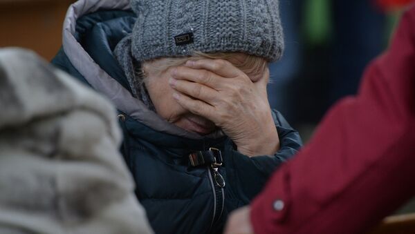 Родственница одного из пропавших без вести при пожаре в торговом центре «Зимняя вишня» в Кемерово - 俄罗斯卫星通讯社