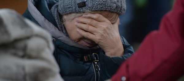 Родственница одного из пропавших без вести при пожаре в торговом центре «Зимняя вишня» в Кемерово - 俄罗斯卫星通讯社