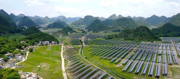 Greenhouses built with solar panels on their roofs, in Yang Fang village - 俄罗斯卫星通讯社