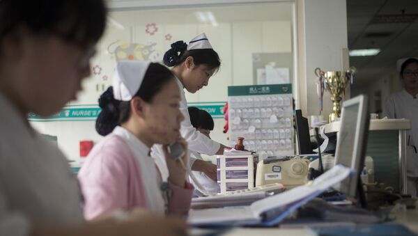 Nurses work at the Beijing Tongren Hospital - 俄羅斯衛星通訊社