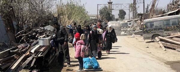 112名武装分子及其逾1000名家人离开叙杜马镇 112名武装分子及其逾1000名家人离开叙杜马镇 - 俄罗斯卫星通讯社