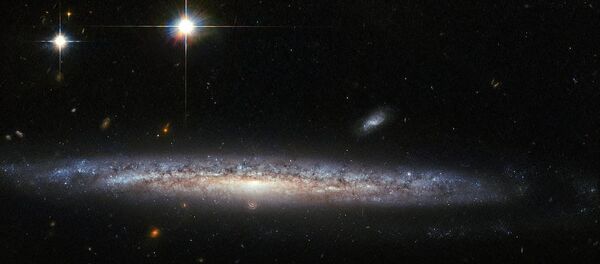 NASA发布拥有超新星的螺旋星系照片 NASA发布拥有超新星的螺旋星系照片 - 俄罗斯卫星通讯社