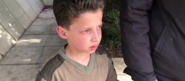 被“白头盔”称为是杜马市化学攻击受害者的11岁叙利亚男孩讲述了视频拍摄情况 - 俄罗斯卫星通讯社