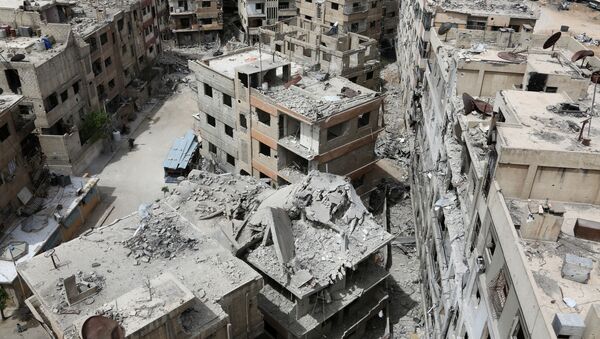 Разрушенные дома в сирийском городе Дума - 俄羅斯衛星通訊社