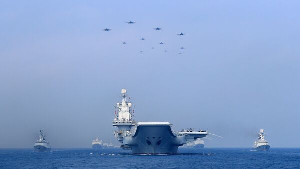 Warships and fighter jets of Chinese People's Liberation Army (PLA) Navy take part in a military display in the South China Sea - 俄羅斯衛星通訊社