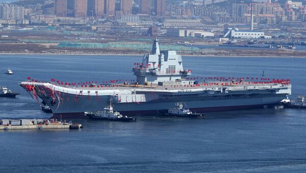 Type 001A, China's second aircraft carrier, is transferred from the dry dock into the water during a launch ceremony at Dalian shipyard - 俄罗斯卫星通讯社