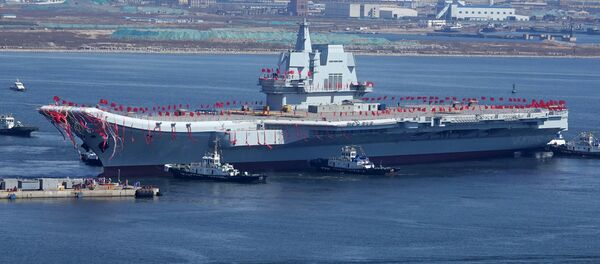 Type 001A, China's second aircraft carrier, is transferred from the dry dock into the water during a launch ceremony at Dalian shipyard Type 001A, China's second aircraft carrier, is transferred from the dry dock into the water during a launch ceremony at Dalian shipyard - 俄罗斯卫星通讯社